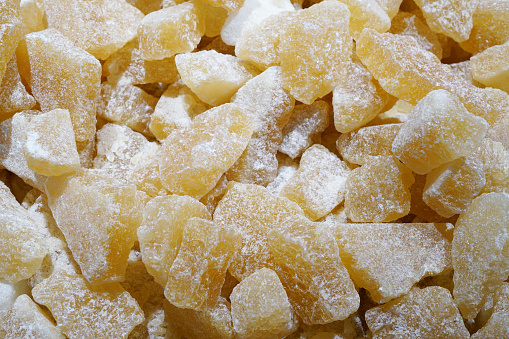 close up on brown crystal sugar as food background