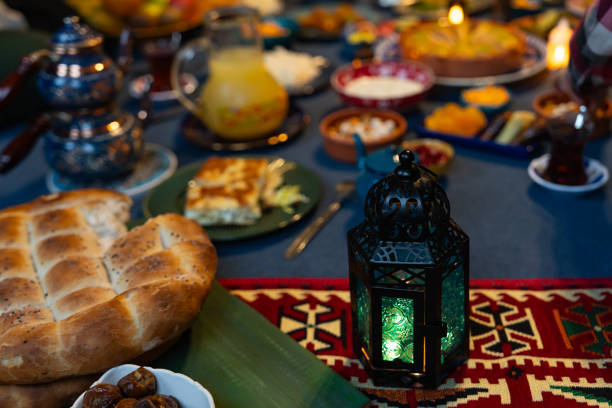 istock Ramadan Iftar Table. Muslim Family Having Dinner At Home. Iftar Table with Traditional Food. Fasting ends with Dates and Turkish Pide. Ramadan Feast Celebrations, Eid Mubarak Concept Uskudar Istanbul, Turkiye (Turkey) 2077058800