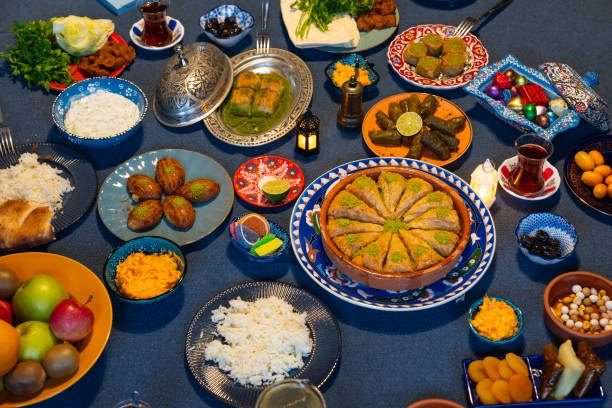 istock Ramadan Iftar Table. Muslim Family Having Dinner At Home. Iftar Table with Traditional Food. Fasting ends with Dates and Turkish Pide. Ramadan Feast Celebrations, Eid Mubarak Concept Uskudar Istanbul, Turkiye (Turkey) 2077063475