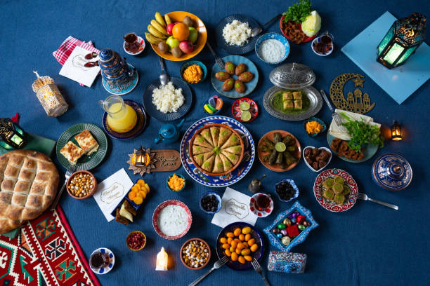 istock Ramadan Iftar Table. Muslim Family Having Dinner At Home. Iftar Table with Traditional Food. Fasting ends with Dates and Turkish Pide. Ramadan Feast Celebrations, Eid Mubarak Concept Uskudar Istanbul, Turkiye (Turkey) 2077067083