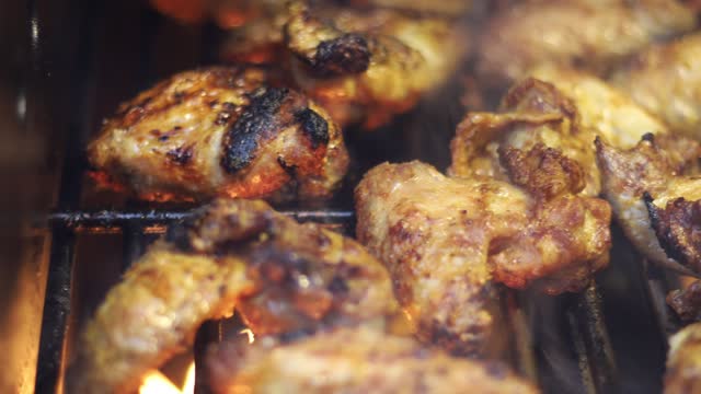 BBQ Chicken wings, Barbecue in the open air, meat, tasty and appetizing meat on the grill.