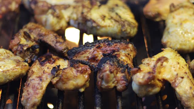 BBQ Chicken wings, Barbecue in the open air, meat, tasty and appetizing meat on the grill.