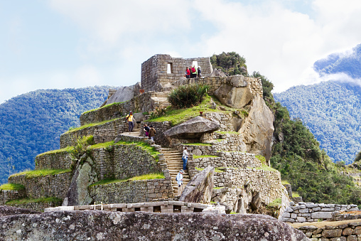 Tourists Exploring Machu Picchu Inca Stone Ruins Peru South America