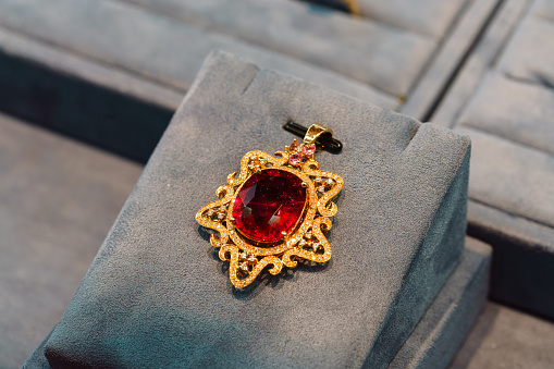 red gemstone necklace