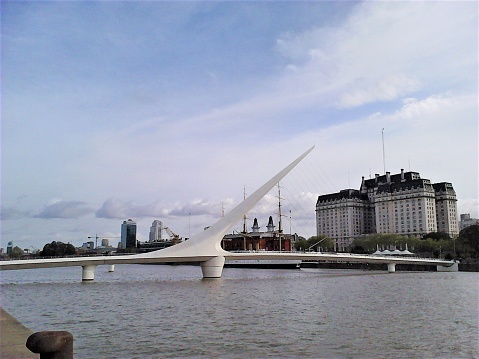 Buenos Aires, Argentina . 01/01/2018 Cityscape of Puerto Madero . The Woman´s Bridge (Puente de la Mujer) designed by the Spanish architect Santiago Calatrava.