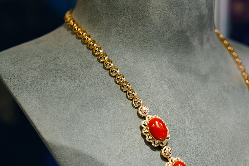 red gemstone necklace