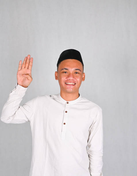 istock Asian young man excited and pointing up 2077263297