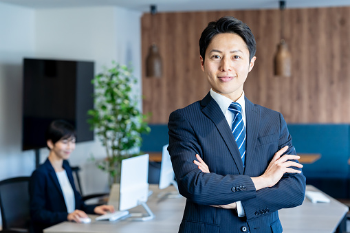 Portrait of young businessman in Marunouchi, Tokyo