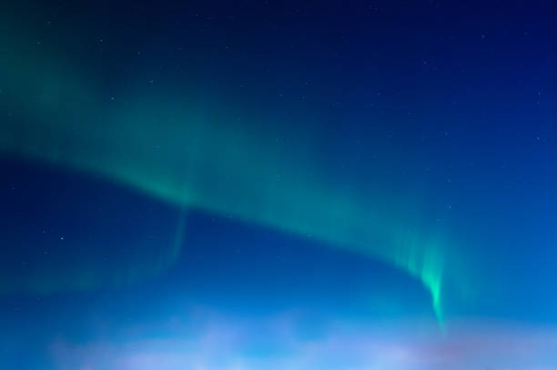 istock Green Aurora borealis on night sky 2077368055