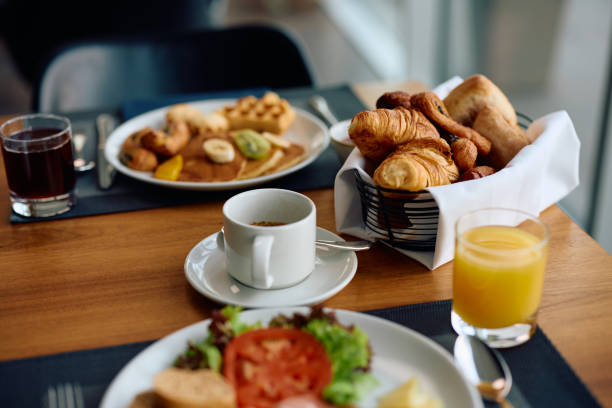 close up of dining table during breakfast in a hotel. - pequeno almoço imagens e fotografias de stock
