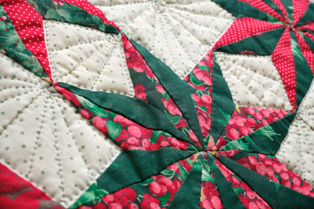 closeup patchwork or quilt with christmas star - christmas quilt blanket green imagens e fotografias de stock