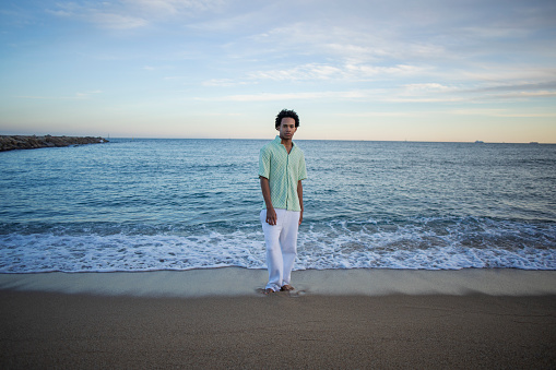 Portrait of young man on the beach