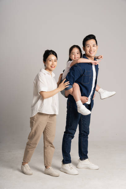 istock Asian family portrait posing on white background 2077508034
