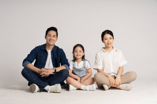 istock Asian family portrait posing on white background 2077511696
