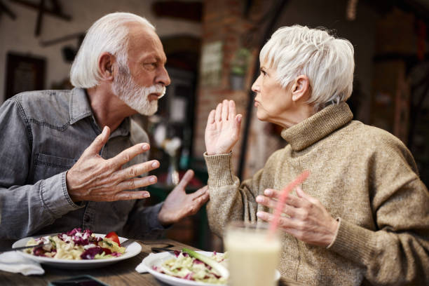 istock Frustrated senior couple arguing in a restaurant. 2077513277