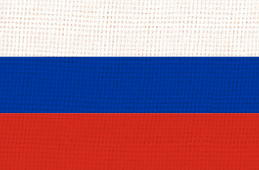 Flag of Russian Federation. russian flag on fabric surface. Fabric texture. National Polish symbol. Polish national flag. European country. Terrorist country. National symbol