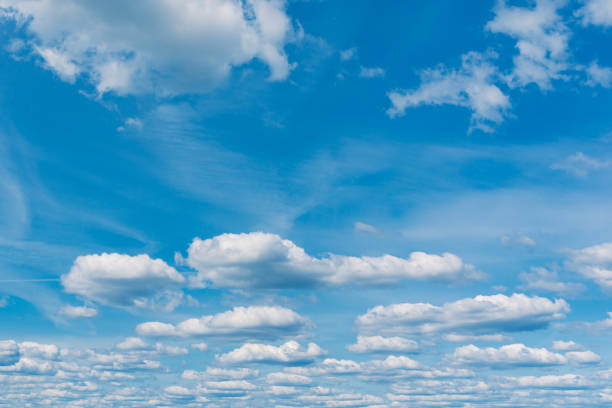 white clouds in the blue sky. white light cloudy heaven,good weather. summer sky. heaven and infinity. curly clouds on a sunny day. beautiful bright blue background. - 11723 zdjęcia i obrazy z banku zdjęć