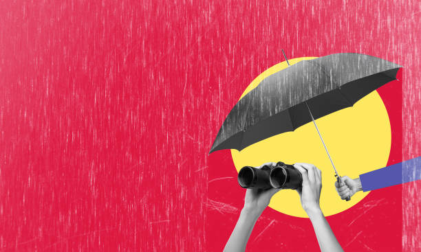 Art collage, binoculars, and umbrella on red background with copy space.