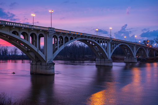 Lincoln Memorial Bridge, adjacent to the George Rogers Clark Memorial, that crosses the Wabash River connecting the towns of Vincennes, Indiana and Westport, Illinois, shown at sunset.