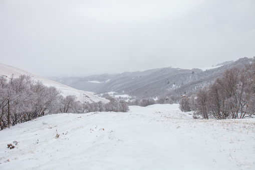 Karachay-Cherkessia, Russia. Caucasus Mountains cold winter landscape.