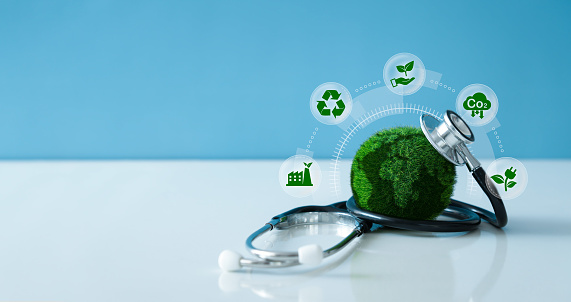 Earth Day - Environment Concept.Green Earth and a stethoscope with Saving the environment and environmentally sustainable icon. Global healthcare. ESG, Net zero, co2.