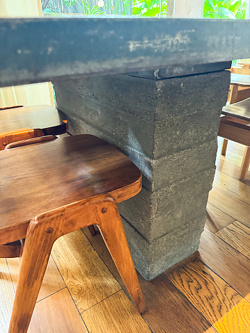Table Using Bricks Image Of Table Made From Bricks Man Using Concrete Blocks And Wood To ...