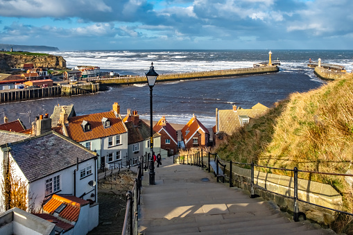 View over Whitby harbour from the 199 steps leading from the town to the Whitby Abbey ruins.