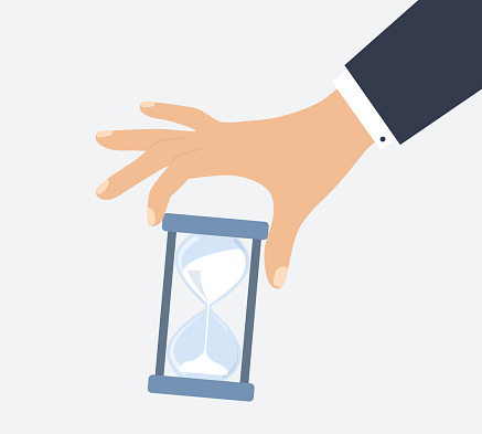 Businessman Holding Hourglass. Time Control And Time Management Concept