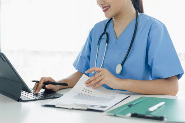 istock Healthcare Professional Analyzing Patient Data on Digital Tablet. 2077736224