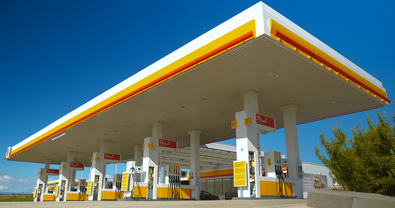 Shell gas station in Croatia 05.05.2023: Retail facility that offers gasoline to fill empty tanks of vehicles en route. Petrol station of a world famous oil company for distribution of fossil fuels.