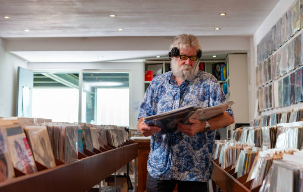 istock Record store owner in  his shop. 2077752292