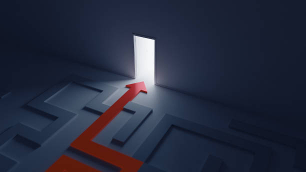 istock The way forward, solution concept. A path leading through the dark labyrinth to the open door 2077754114
