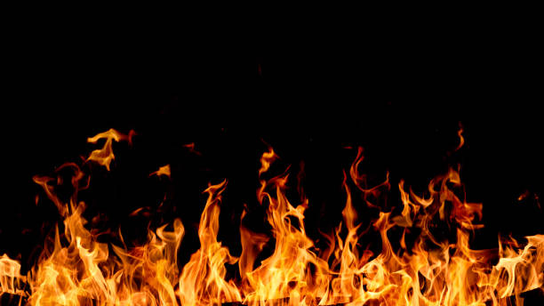 istock Blazing Fire isolated on black background 2077755147