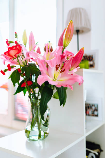 Alstromerija flower in a modern vase. Copy space for text. Represents love, friendship, success, good luck, symbolizing great grace and dignity.