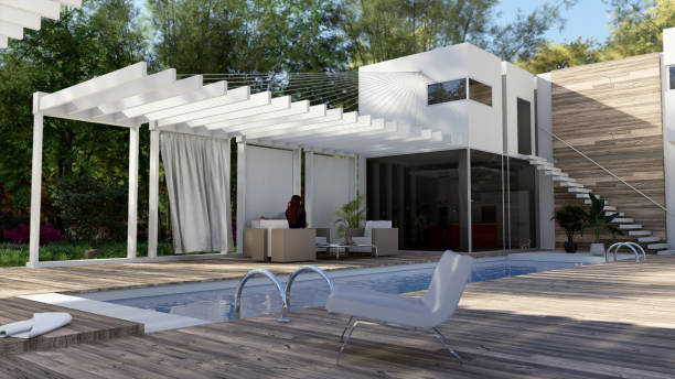 istock House exterior with a pool and a sitting area with a pergola 2077785432