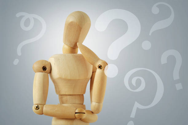 istock Wooden mannequin in thinking pose with quesion marks - Concept of question thinking and doubts 2077828854