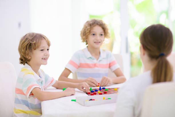 istock Family playing board game. Kids play. 2077860299