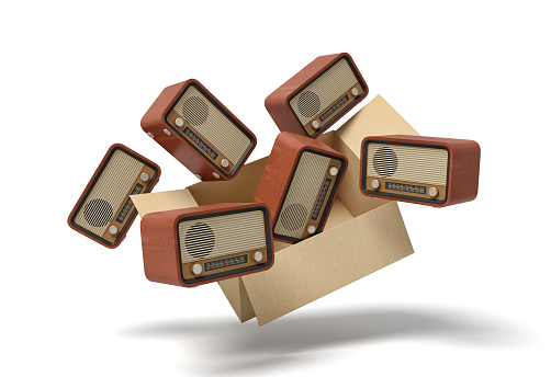 3d rendering of cardboard box full of old-fashioned radios in mid-air. Technology of past. Feeling nostalgic. Garage market.