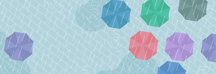 Vector illustration of multiple umbrellas viewed from above in the rain