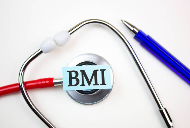 istock BMI Body Mass Index inscription,text with stethoscope. BMI medical concept. 2077915638