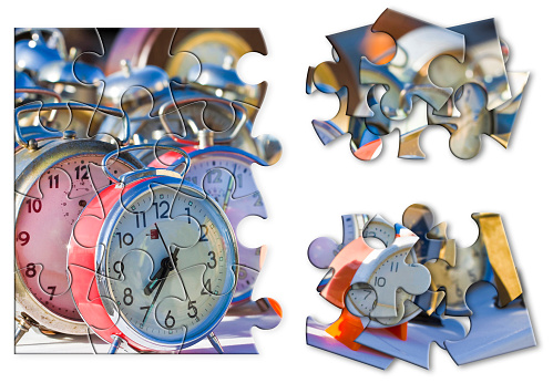Learn to manage the time - Old colored metal table clocks, concept image in jigsaw puzzle shape