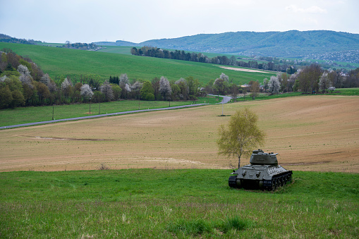 Green meadows, fields, spring forests and Russian tanks.