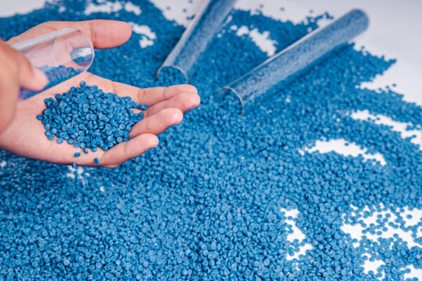istock White plastic grain, plastic polymer granules,hand hold Polymer pellets, Raw materials for making water pipes, Plastics from petrochemicals and compound extrusion, resin from plant polyethylene. 2077957443