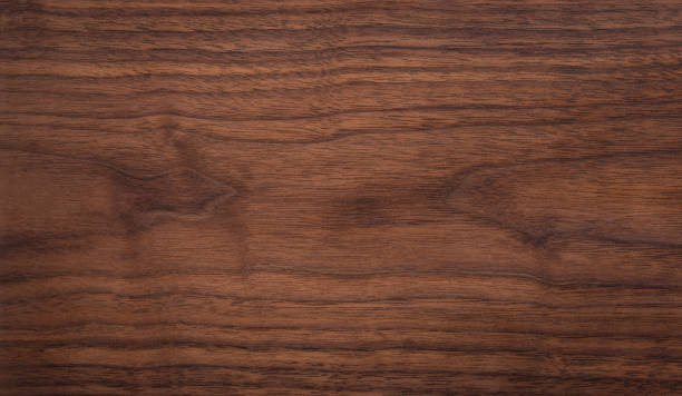 istock Walnut wood texture background. Black walnut wood texture background. wood texture 2077961095