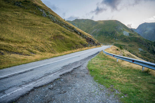istock Asphalt road in a beautiful environment high in the mountains 2078039641