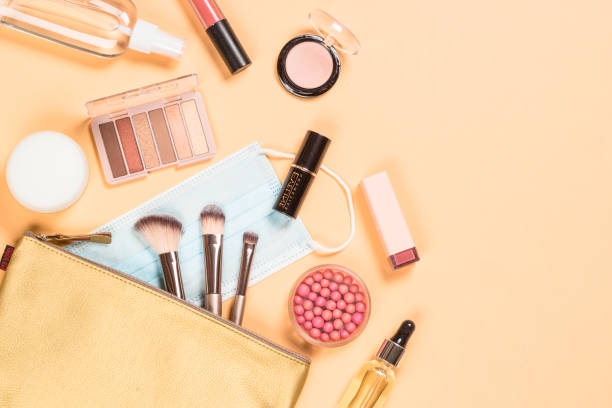 istock Professional cosmetics in make-up bag at color background. 2078040173