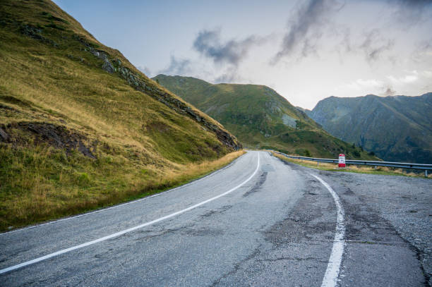 istock Asphalt road in a beautiful environment high in the mountains 2078042834