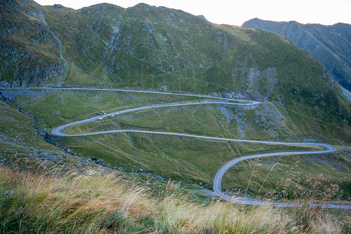 The long and winding road over one of the alpine passes at famous nockberge in austria