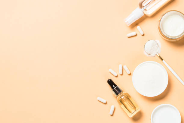 istock Collagen powder dietary supplement at blue. 2078063816