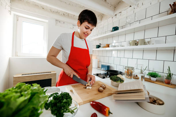 istock Preparing lunch according to the recipe 2078071599